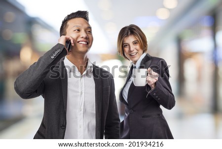 A business young man and woman working together as a team