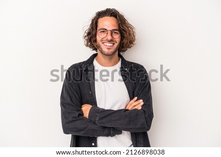 Similar – Image, Stock Photo Long haired young handsome man on a black background with a light illuminating his face, with a flirtatious expression for the camera showing a slight smile