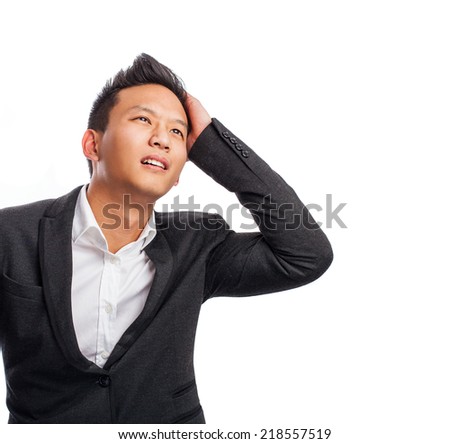portrait of a young asian business man worried