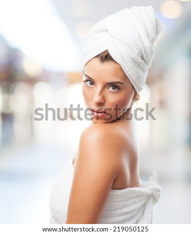 young woman with a sensual look after a bath