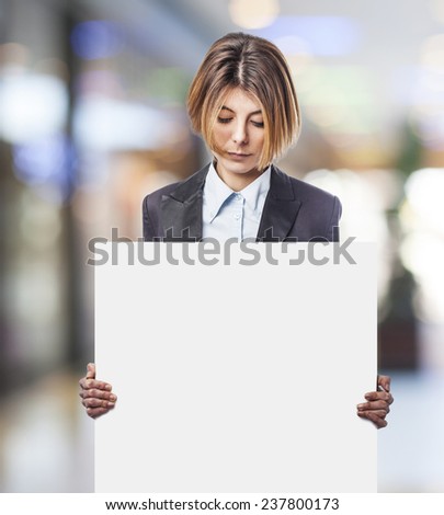 portrait of a pretty young woman holding a white banner