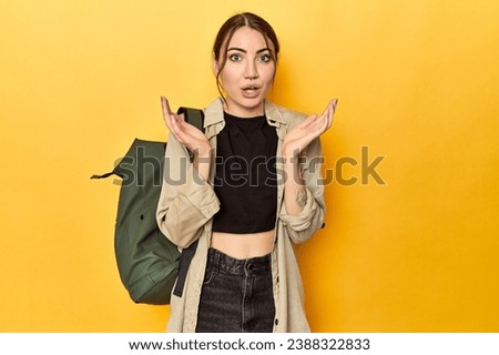 Similar – Image, Stock Photo Pleased tourist with backpack taking selfie on smartphone sitting on bridge above mountain river