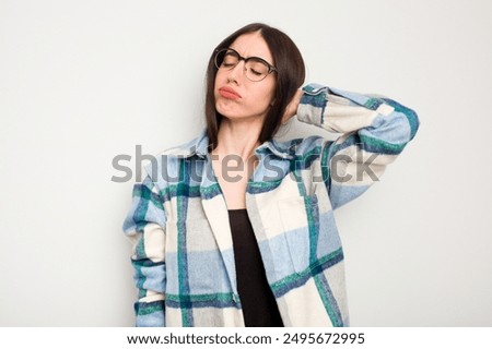 Image, Stock Photo Portrait of very tired & exhausted female UK NHS doctor in front of hospital,blurry out of focus background, Coronavirus COVID-19 pandemic outbreak crisis,overworked medical staff working long shifts