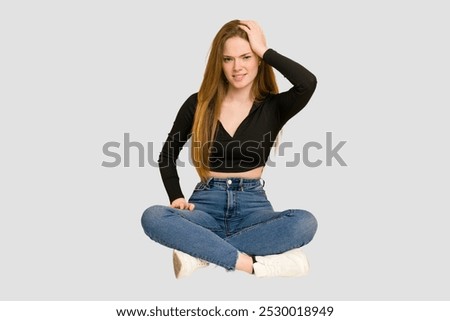 Similar – Image, Stock Photo Young redhead woman sit on grey linen fabric under orange coat with flowers and rowan berries