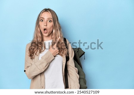 Similar – Image, Stock Photo Pleased tourist with backpack taking selfie on smartphone sitting on bridge above mountain river