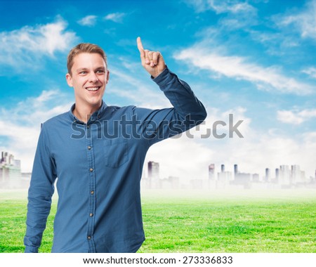 happy young-man pointing up