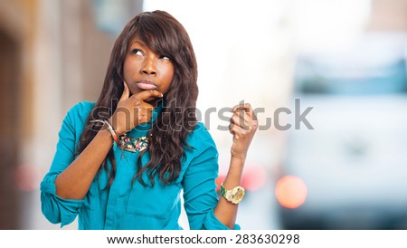 black woman holding something with hand
