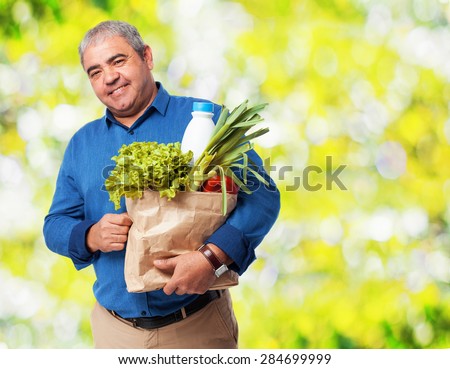 man holding a food bag