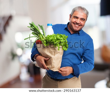 man holding a food bag