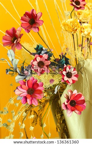 Artificial flowers bright and beautiful colors in vase