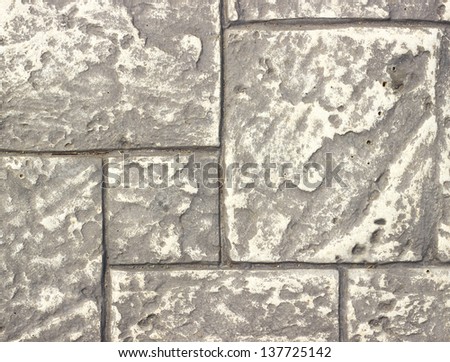Rough textured concrete tiles walkway background