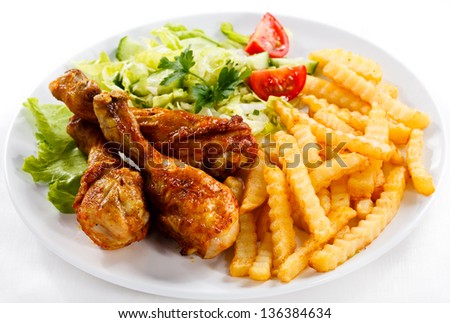 fried chicken with fries on a plate