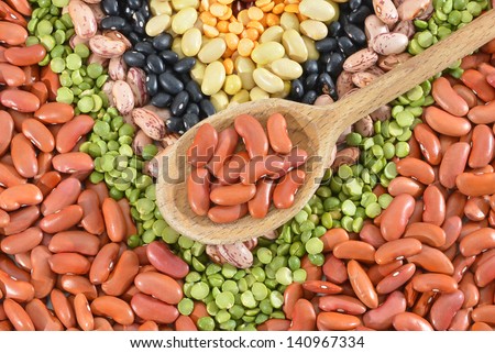 The ranks of different beans: kidney, roman, black eye,edamame, adzuki View from above.