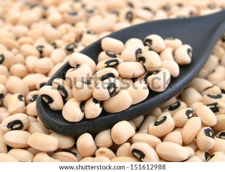 Black-eyed Beans and spoon on  background.