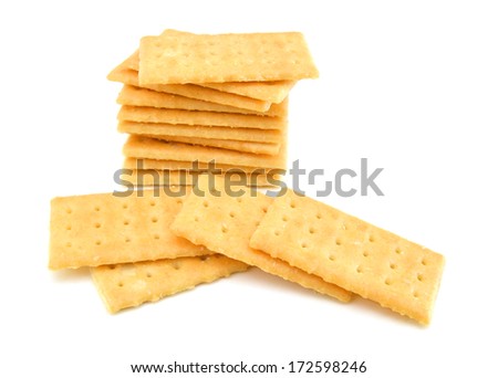 Salty crackers in square shape on white background