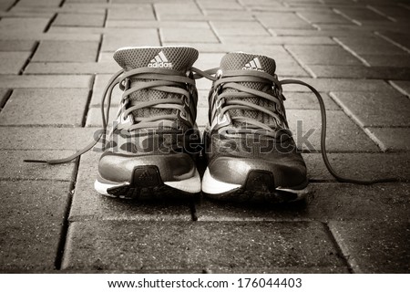 Ipswich, Australia - January 2 2014 - Photo of a pair of Adidas running shoes.  Processed in B&W.