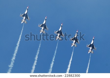 HOUSTON, TX - OCTOBER 25: USAF Thunderbirds fly in formation during performance at Wings over Houston Air Show on October 25, 2008.