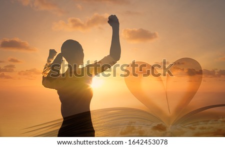  Young woman with arms flexed up to the sky. Religious symbol, worship, self belief, life goals concept.    商業照片 © 