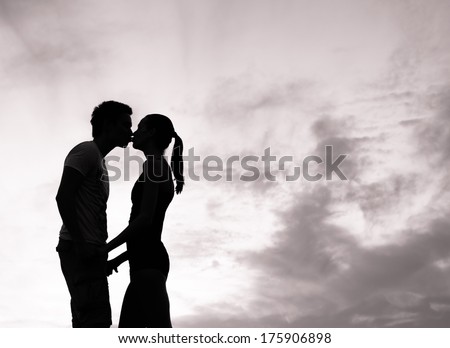 Romantic couple in love kissing.