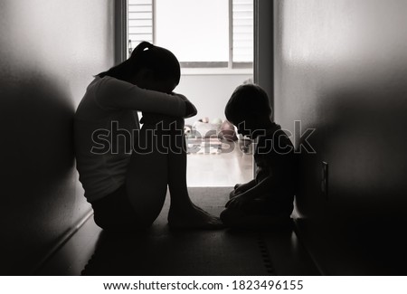 Similar – Image, Stock Photo Serious mother and kids spending time together using gadgets on sofa at home