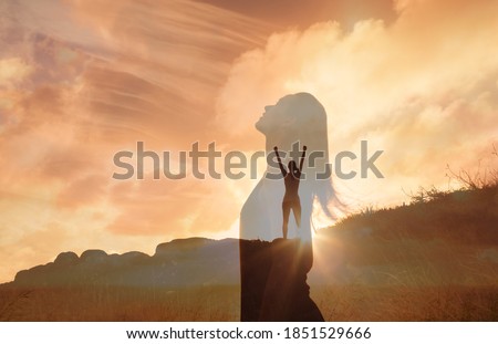 Woman celebrating on a mountain looking up to the sky. Letting go of all your mental fears. Hope, mental strength concept. Double exposure.  Photo stock © 