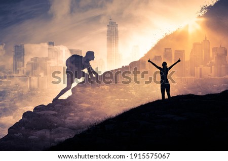 Strong man and woman climbing up mountain overcoming obstacles. Never give up, power and strength concept.  Double exposure. 