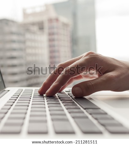 Business person using a laptop.