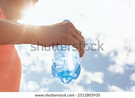 Similar – Image, Stock Photo Sportswoman with bottle of water after workout