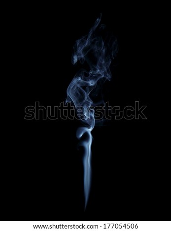 Smoke from cigarettes closeup on black background
