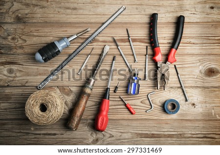 set of work tools on a wooden table horizontal format