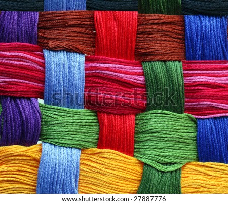 Colorful abstract background made by embroidery threads