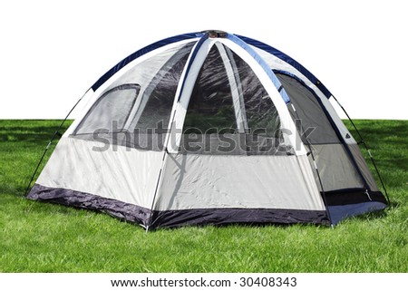Nylon tent sitting on the green grass