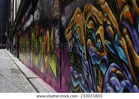 MELBOURNE, AUSTRALIA, 21 NOVEMBER 2014. Graffiti in alleyway by unidentified artist. Importance of youth projects street art recognized.