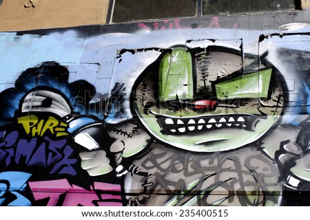 MELBOURNE, AUSTRALIA, 28 NOVEMBER 2014. Graffiti on wall by unidentified artist. Importance of youth projects street art recognized.