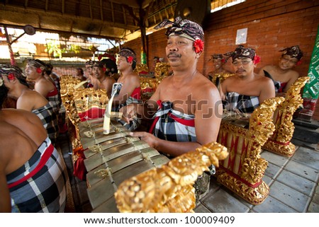 BALI, INDONESIA - APRIL 9: Balinese musicians during a classic national Balinese dance Barong on April 9, 2012 on Bali, Indonesia. Barong is very popular cultural show on Bali.