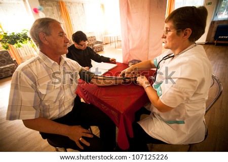 PODPOROZHYE, RUSSIA - JULY 3: Day of Health in Center of social services for pensioners and the disabled Otrada (Medical examination of disabled), July 3, 2012 in Podporozhye, Russia.