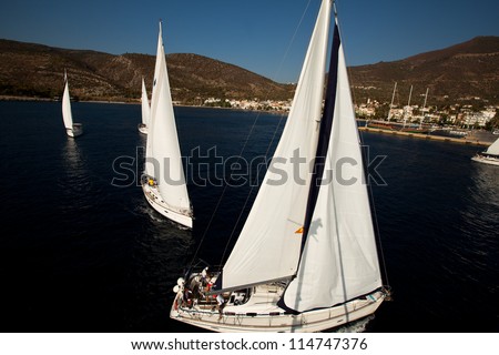 SARONIC GULF, GREECE - SEPTEMBER 28: Competitors boats during of sailing regatta \