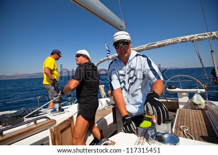 SARONIC GULF, GREECE - SEPTEMBER 24: Unidentified sailors participates in sailing regatta \