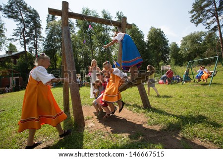 TERVENICHI, RUSSIA - JUL 7: Unidentified children during Ivan Kupala Day, Jul 7, 2013, Tervenichi, Russia. Celebration relates to the summer solstice and includes a number of fascinating Pagan rituals