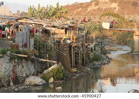 KATHMANDU, NEPAL - JANUARY 7: A generic view of a poor housing area at Old Baneshwor near Bagmati river January 7, 2009 in Kathmandu Nepal.