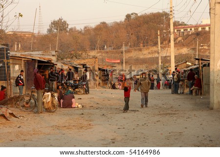 KATHMANDU, NEPAL - JANUARY 7: A generic view of a poor housing area at Old Baneshwor near Bagmati river January 7, 2009 in Kathmandu Nepal.