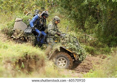 KOSTROMA REGION - AUGUST 26: Buggy and Quads with divers-saboteurs on the Command post exercises with 98-th Guards Airborne Division, August 26, 2010 in Kostroma region, Russia.