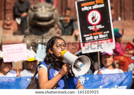 KATHMANDU, NEPAL - NOV 29: Unidentified participants protest within a campaign to end violence against women (VAW), Nov 29, 2013 in Kathmandu, Nepal. Held annually since 1991, 16 days Nov 25 - Dec 10.