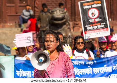 KATHMANDU, NEPAL - NOV 29: Unidentified participants protest within a campaign to end violence against women (VAW), Nov 29, 2013 in Kathmandu, Nepal. Held annually since 1991, 16 days Nov 25 - Dec 10.
