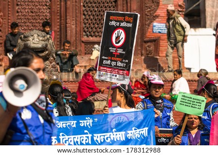 KATHMANDU, NEPAL - NOV 29, 2013: Unidentified participants protest within a campaign to end violence against women (VAW) Held annually since 1991, 16 days from Nov 25 to Dec 10.