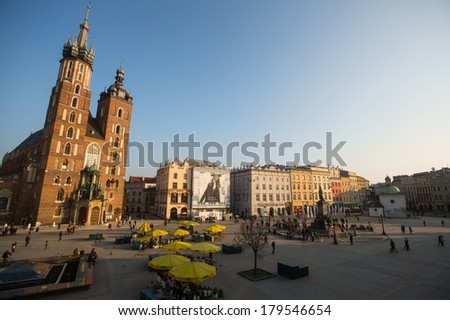 KRAKOW, POLAND - FEB 26, 2014: View of the Main Square. It dates to the 13th century, and at roughly 40,000 m it is the largest medieval town square in Europe.