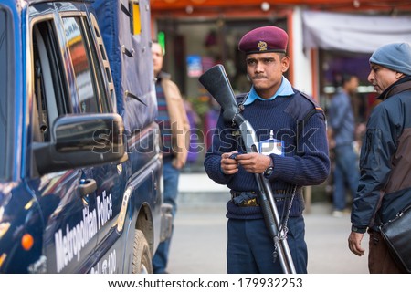 KATHMANDU, NEPAL - DEC 2, 2013: Polices during protest within a campaign to end violence against women (VAW). Held annually since 1991, 16 days from Nov 25 to Dec 10.