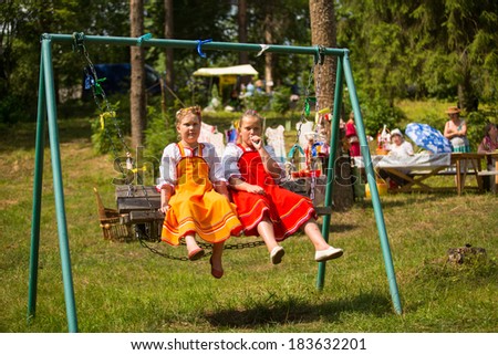 TERVENICHI, RUSSIA - JUL 7, 2013: Unidentified girls during Ivan Kupala Day. The celebration relates to the summer solstice and includes a number of fascinating Pagan rituals