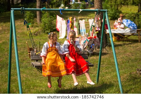 TERVENICHI, RUSSIA - JUL 7, 2013: Unidentified local children celebrated Ivan Kupala Day. The celebration relates to the summer solstice and includes a number of fascinating Pagan rituals.