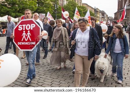 KRAKOW, POLAND - JUNE 1 , 2014 : Rally against abortion in defense of life and family. Inscriptions on a banners : Stop abortion, the right to be born each child etc.